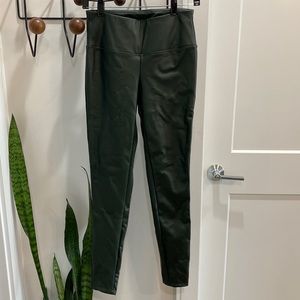 Green faux leather leggings